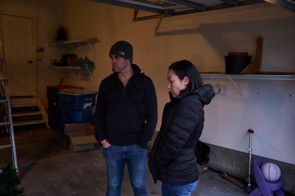 The Hawkins family stands in their garage at their home in Chesterfield, Missouri, on Jan. 11, 2024.
