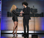 <p>The “Perfect” singer made a surprise appearance at the Sports Illustrated 2017 Sportsperson of the Year Show on Tuesday night, at the Barclays Center in Brooklyn, where she presented Colin Kaepernick with the Muhammad Ali Legacy Award. Bey said she was “proud and humbled” to be there, and cheered the NFL player for taking action with “no fear of consequence or repercussion. Only hope to change the world for the better.” (Photo: Slaven Vlasic/Getty Images for Sports Illustrated) </p>