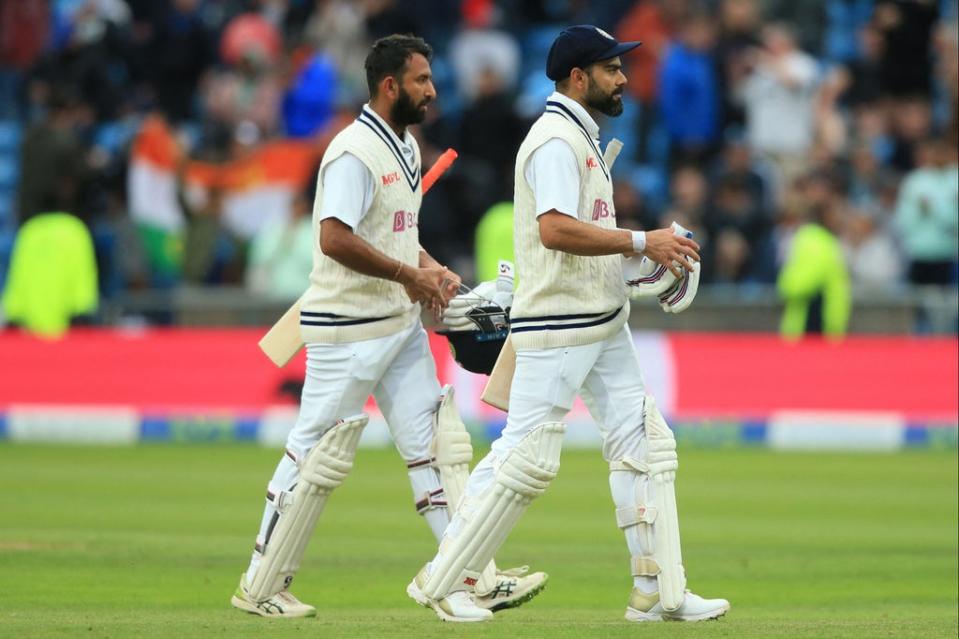 Cheteshwar Pujara and Virat Kohli leave the field unbeaten on the third evening (AFP via Getty Images)