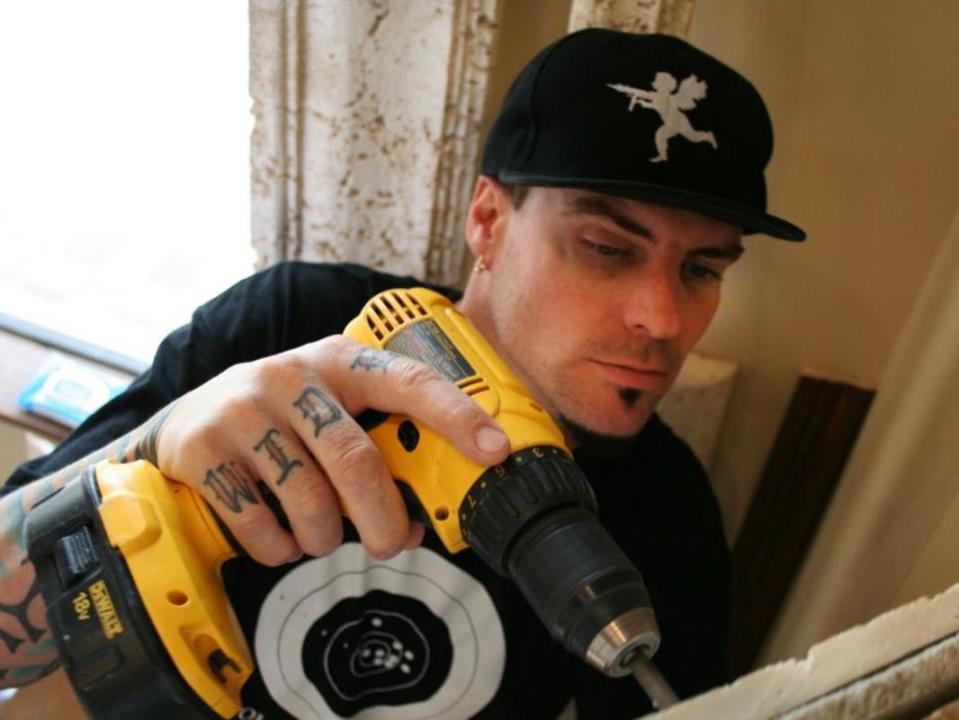 Robert Van Winkle works on a property for "The Vanilla Ice Project."<p>HGTV/DIY Network</p>
