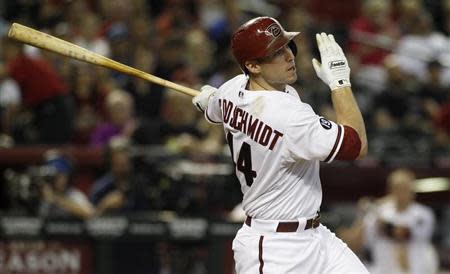 Arizona Diamondbacks' Paul Goldschmidt hits an RBI double to right field against the Los Angeles Dodgers during the third inning of their MLB National League baseball game in Phoenix, Arizona September 19, 2013. REUTERS/Ralph D. Freso