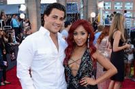 <p>It was the summer of 2010, the cabs were there and Snooki was living with her housemates on season 3 of <em>Jersey Shore</em>. The reality star met Jionni LaValle at a nightclub and the rest is <em>amore</em>. The couple welcomed their first son, Lorenzo, in 2012 and married two years later. Since then, they've had two more little meatballs, Giovanna and Angelo.</p>