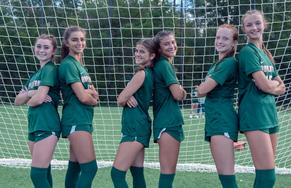 Hopkinton High School soccer sisters, from left: junior Fotini Grontzos, Juliana Grontzos; freshman Sophia Tzouganatos, junior Nina Tzouganatos; senior Georgie Clarke, sophomore Alex Clarke, Sept. 12, 2023.