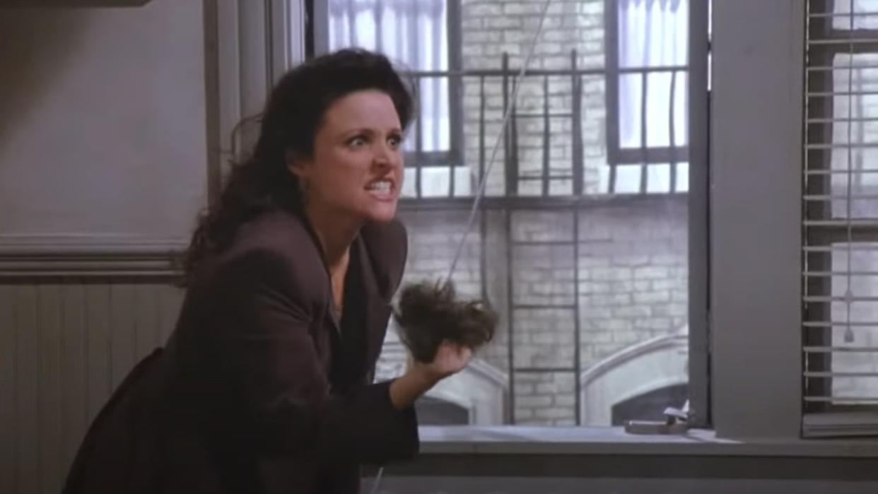  Elaine tosses George's toupee out the window on Seinfeld. 