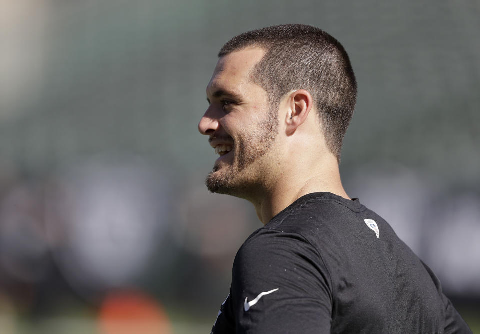 Oakland Raiders quarterback Derek Carr will miss just one game after suffering a fracture in his back. (AP)