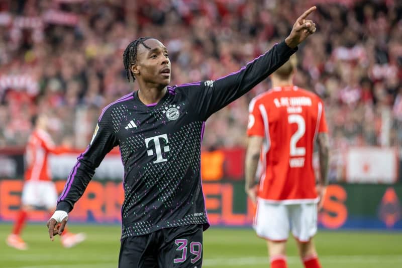 Bayern Munich's Mathys Tel celebrates scoring his side's fourth goal during the German Bundesliga soccer match between 1. FC Union Berlin and Bayern Munich at An der Alten Foersterei. Andreas Gora/dpa