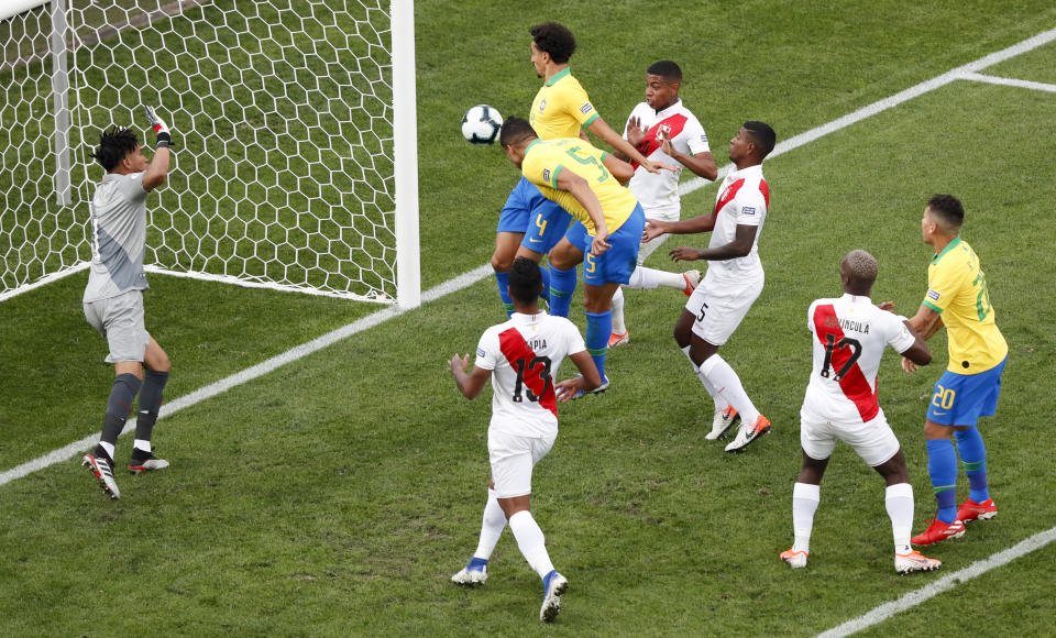 Brazil's Casemiro heads the ball to score his side's opening goal during a Copa America Group A soccer match against Peru at the Arena Corinthians in Sao Paulo, Brazil, Saturday, June 22, 2019. (AP Photo/Nelson Antoine)