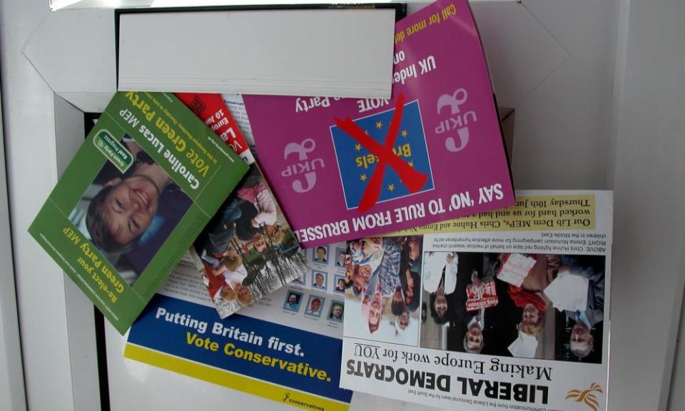 Election leaflets from 2004 sticking through a letterbox