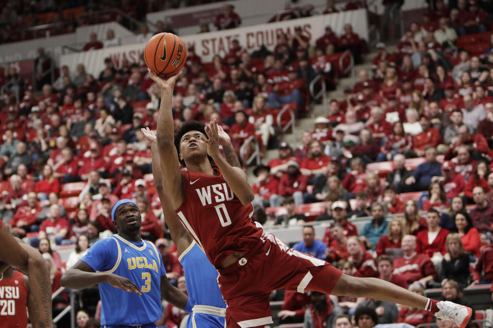 Washington State forward Jaylen Wells (0) shoots during the second half of an NCAA college basketball game against UCLA, Saturday, March 2, 2024, in Pullman, Wash. (AP Photo/Young Kwak)