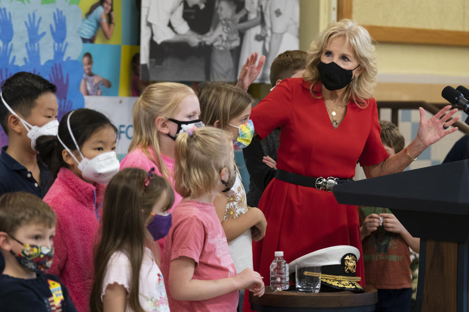 First lady Jill Biden speaks to parents, students, teachers and school staff during a visit to a pediatric COVID-19 vaccination clinic at Franklin Sherman Elementary School in McLean, Va., with Surgeon General Dr. Vivek Murthy, to kick off a nationwide effort urging parents and guardians to vaccinate kids ages 5 to 11, Monday, Nov. 8, 2021. (AP Photo/Manuel Balce Ceneta)