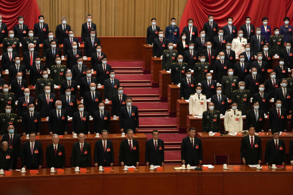 Delegates attend the closing ceremony of the 20th National Congress of China's ruling Communist Party at the Great Hall of the People in Beijing, Saturday, Oct. 22, 2022. (AP Photo/Ng Han Guan)