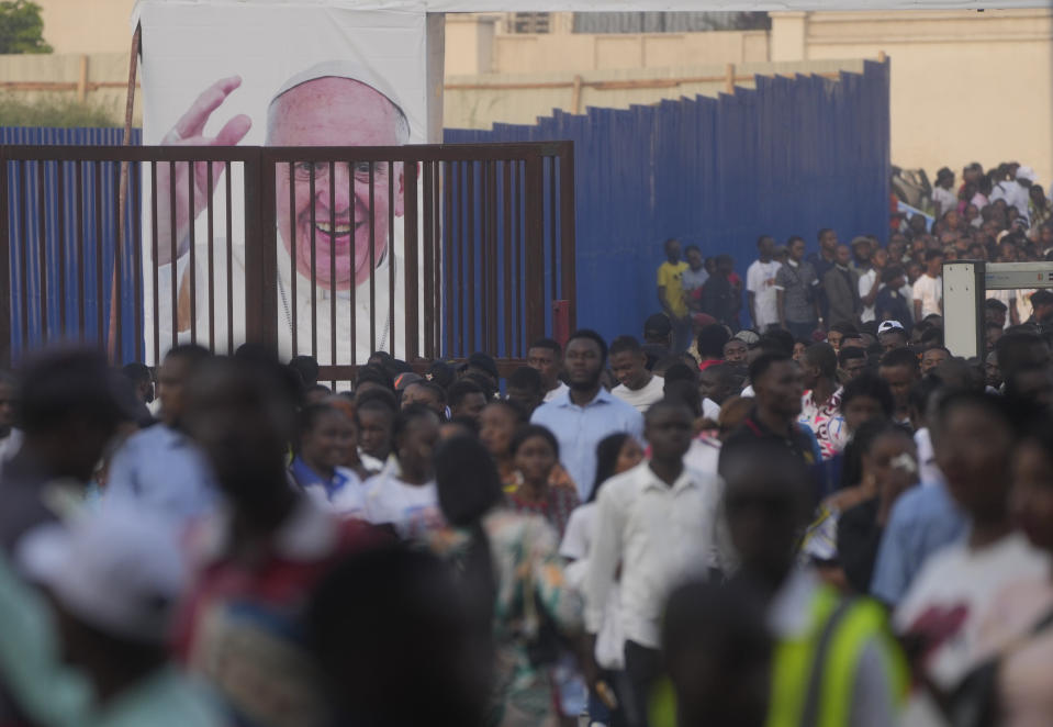 Faithful crowd the Martyrs' Stadium in Kinshasa, Democratic Republic of Congo for a meeting between Francis and young people, Thursday, Feb. 2, 2023. Francis is in Congo and South Sudan for a six-day trip, hoping to bring comfort and encouragement to two countries that have been riven by poverty, conflicts and what he calls a "colonialist mentality" that has exploited Africa for centuries. (AP Photo/Gregorio Borgia)