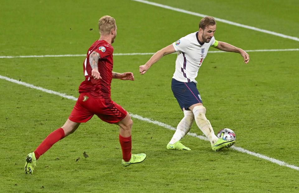 England's Harry Kane scores his team's second goal during the Euro 2020 soccer championship semifinal between England and Denmark at Wembley stadium in London, Wednesday, July 7, 2021. (Justin Tallis/Pool Photo via AP)