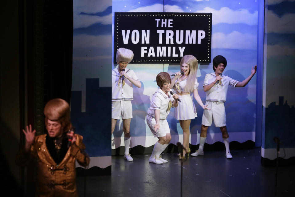 In this Wednesday, Dec. 4, 2019 photo, characters portraying the Trump family and President Donald Trump perform during the musical "Beach Blanket Babylon" in San Francisco. The campy small San Francisco show that's been a must-see for tourists and locals alike for more than 45 years is closing its curtain. The show, which spoofs politics and pop culture, started in 1974, making it the nation's longest continuously running musical revue. Its final performance is set for New Year’s Eve. (AP Photo/Eric Risberg)