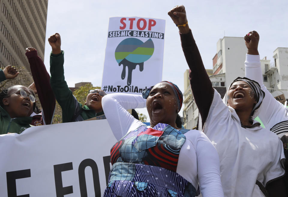 FILE - Environmental activists take part in a protest calling for the government to take immediate action against climate change in Cape Town, South Africa, Sept. 24, 2022. Young climate activists from African nations have high demands but low expectations for the U.N. climate conference which begins Sunday, Nov. 6, in the Egyptian coastal resort of Sharm el-Sheikh. (AP Photo/Nardus Engelbrecht, File)