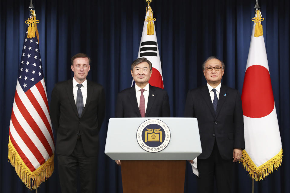 South Korea's National Security Adviser Cho Tae-yong, center, U.S. National Security Advisor Jake Sullivan, left, and Japan's National Security Secretariat Secretary-General Takeo Akiba pose before a joint news conference at the presidential office, Saturday, Dec. 9, 2023, in Seoul, South Korea. The meeting comes as the three countries are stepping up cooperation amid North Korea's persistent military threats and Russia's protracted war in Ukraine. (Chung Sung-Jun/Pool Photo via AP)