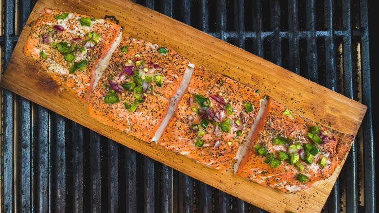 Cedar plank salmon on grill