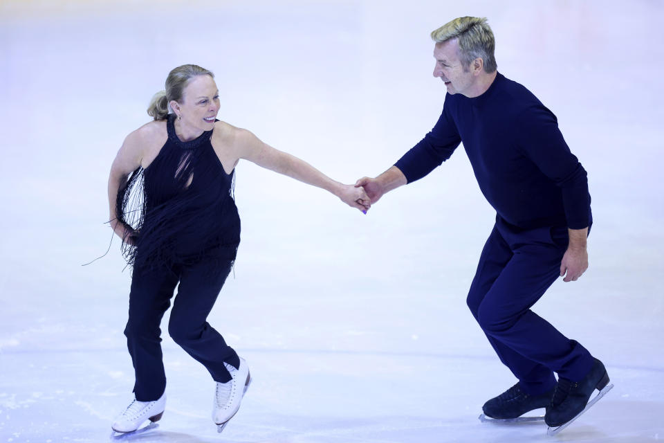 British ice dancers Jayne Torvill and Christopher Dean perform the routine which gave them the first, and so far only, perfect score in Olympic skating history, Bolero, during an ice skating show, in Sarajevo, Bosnia, Wednesday, Feb. 14, 2024. The pair received a warm welcome as they returned to Sarajevo to mark the 40th anniversary of their gold medal-winning Winter Olympic performance. (AP Photo/Armin Durgut)