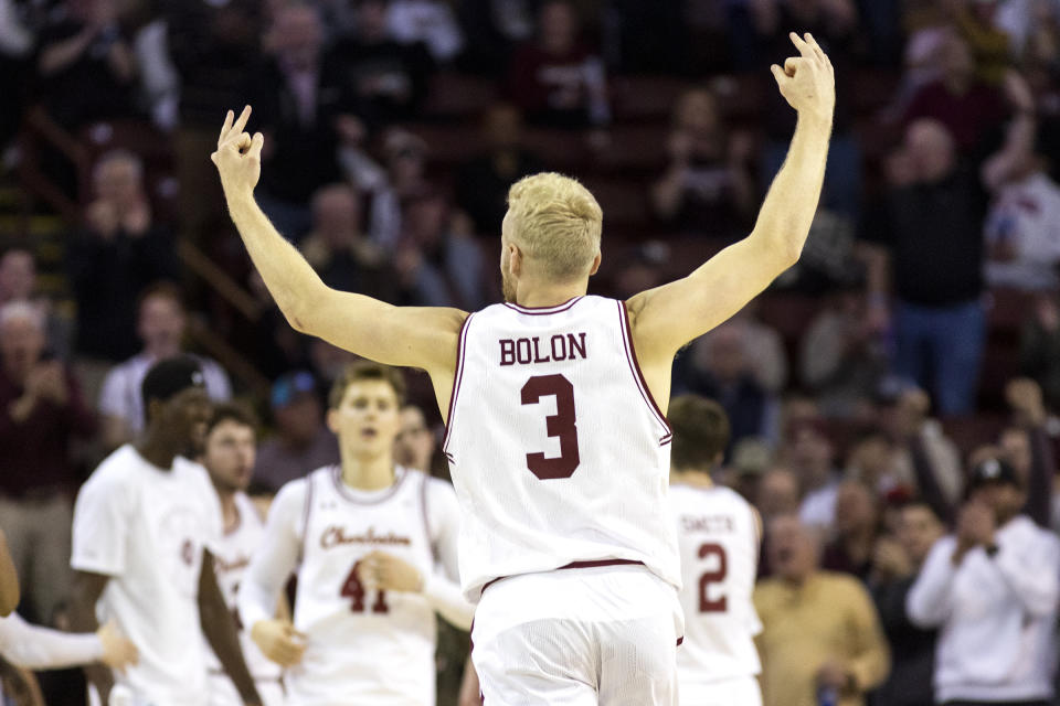 College of Charleston's Dalton Bolon (3) shows the fans he made a three during their game against William & Mary in the first half of an NCAA college basketball game in Charleston, S.C., Monday, Jan. 16, 2023. (AP Photo/Mic Smith)