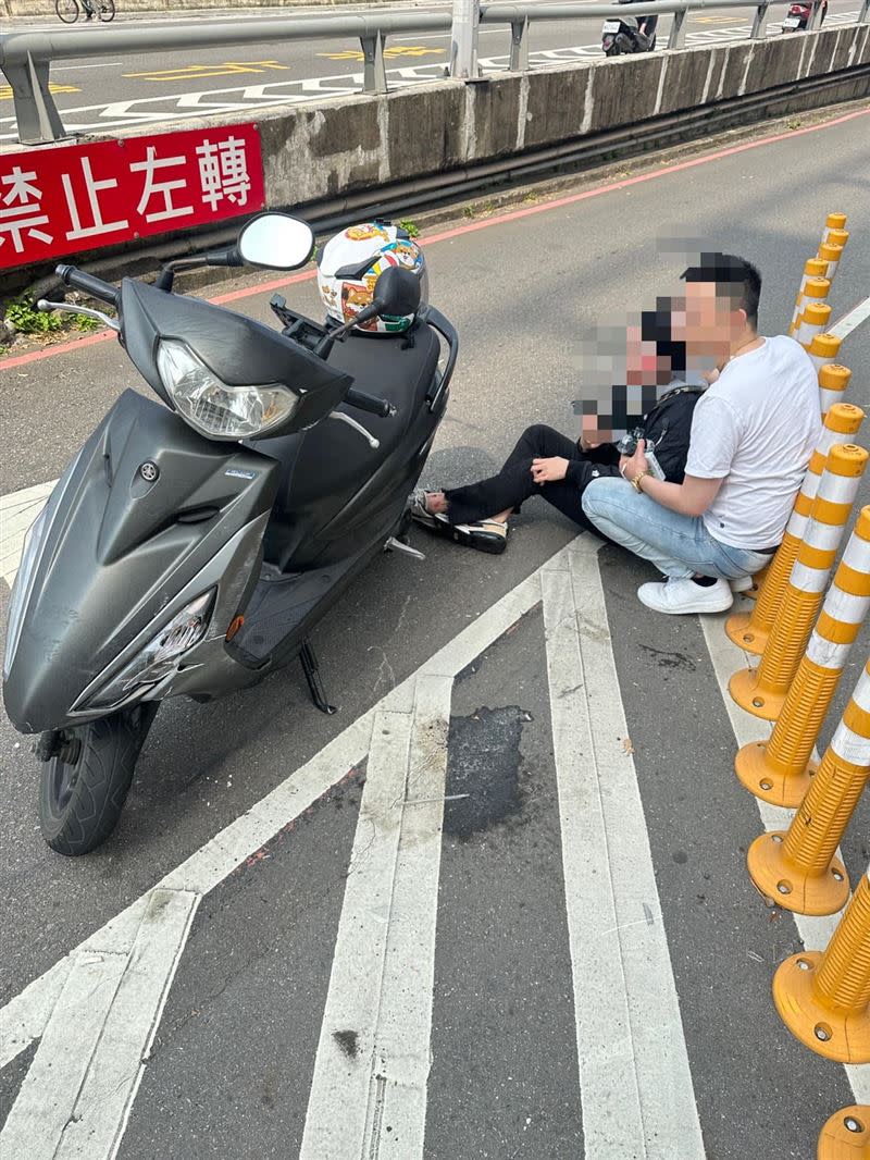 懷有身孕的女騎士摔車，休旅車卻肇事逃逸。（圖／翻攝畫面）