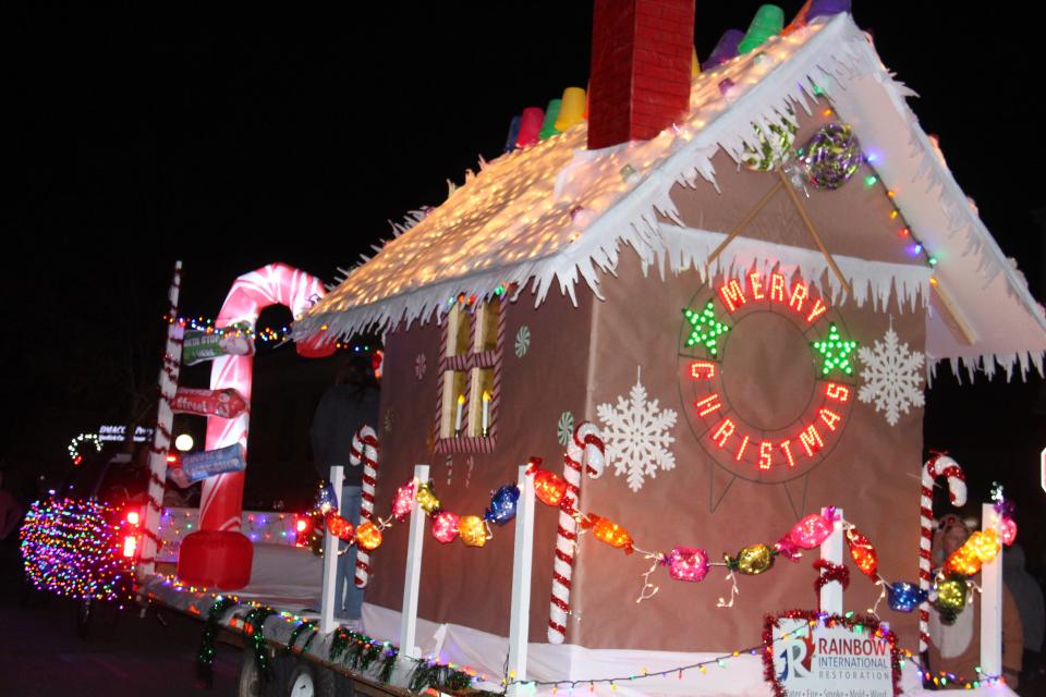 Rainbow International participates in Perry's Lighted Holiday Parade on Friday, Nov. 25, 2022.