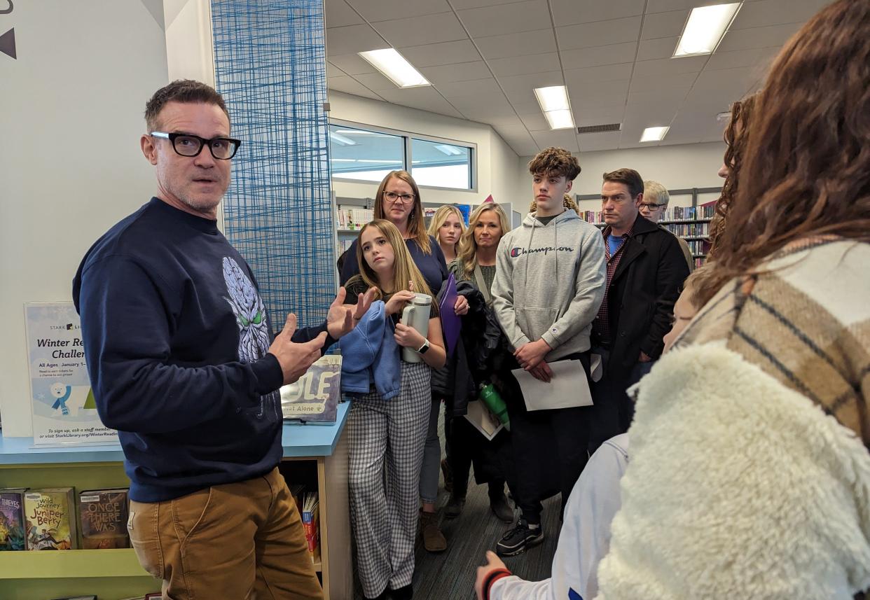 North Canton native actor-director Eddie McClintock, left, talks to aspiring actors who turned up for an open casting call on Saturday in Jackson Township for his new autobiographical film "Takedown," which will be shot in Stark County.