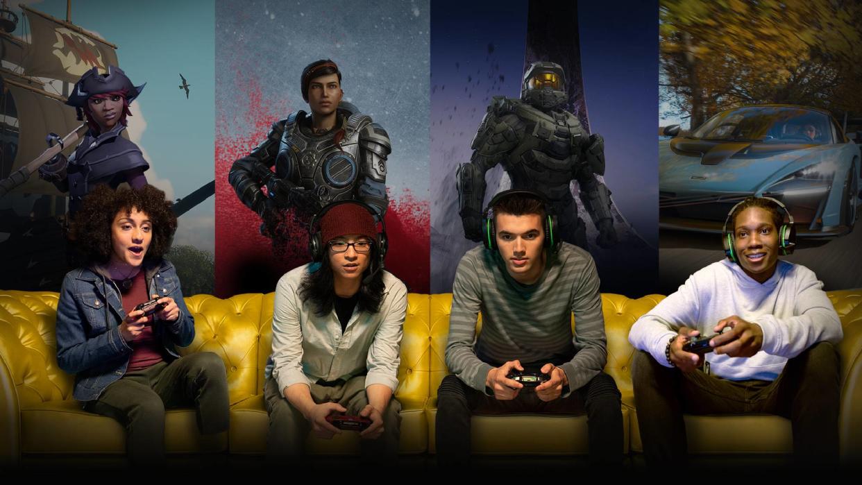  A promo image for Xbox Live Gold showing four people playing video games on a couch  