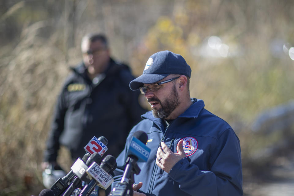 Kentucky Emergency Management Director Jeremy Slinker speaks to members of the media about the rescue operation underway for a worker trapped inside a collapsed coal preparation plant in Martin County, south of Inez, Ky., on Wednesday, Nov. 1, 2023. Officials said one worker died. (Ryan C. Hermens/Lexington Herald-Leader via AP)