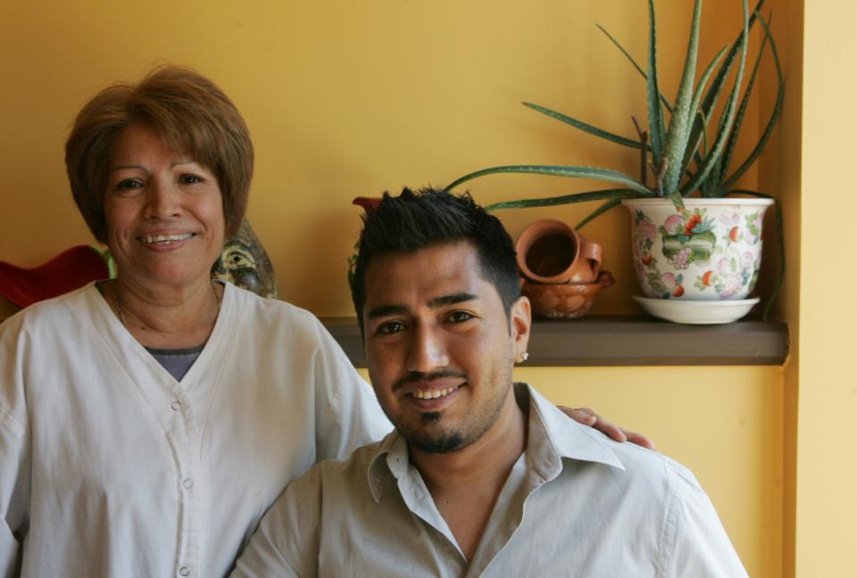 Maria Meza and son Joaquin Meza Jr. at the now-closed El Rancho Grande. She was 56 when she opened the restaurant.