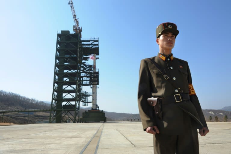 File photo of a North Korean soldier standing guard at the Sohae Satellite Launch Station in Tongchang-Ri, where fresh satellite images suggest North Korea has completed upgrades