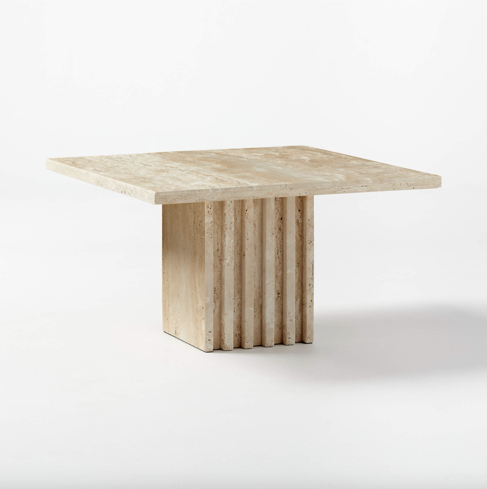 23) Carve Travertine Small Cocktail Table