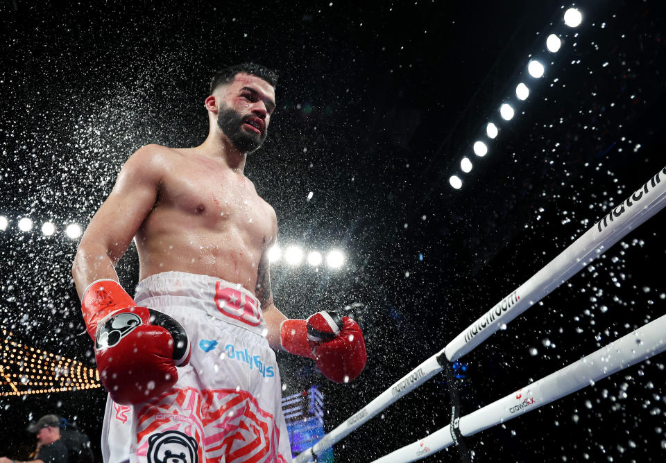 NEW YORK, NEW YORK - FEBRUARY 04:  John Bauza heads back to his corner between rounds against Richardson Hitchins during their Super Lightweight fight  at The Hulu Theater at Madison Square Garden on February 04, 2023 in New York City. (Photo by Al Bello/Getty Images)