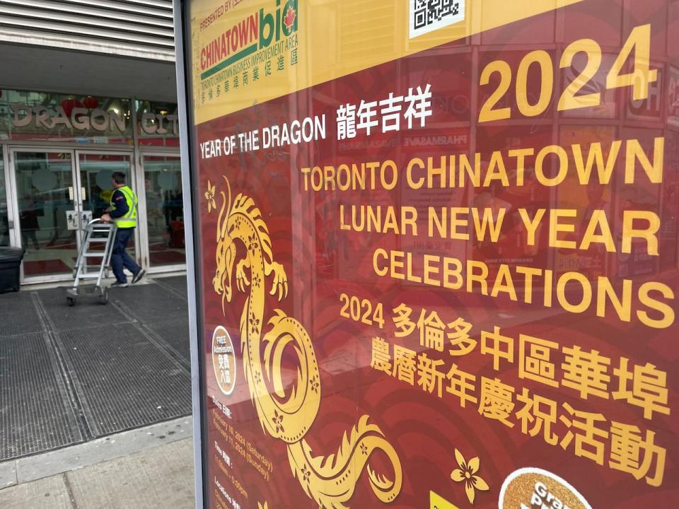 Chinatown's main Lunar New Year festivities are taking place at the Dragon City Mall, pictured here behind a bus stop ad for the event, and Chinatown Centre.