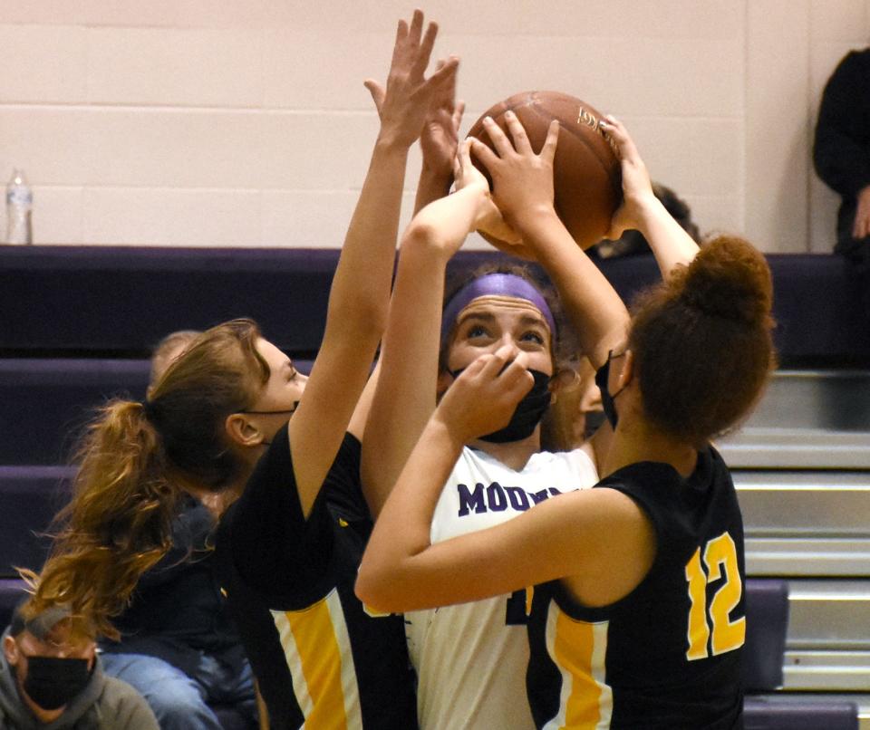 Little Falls Mountie Olivia Brand looks for room to pass or shoot out of a trap against Canajoharie during the Kasner Klassic's opening round Tuesday.