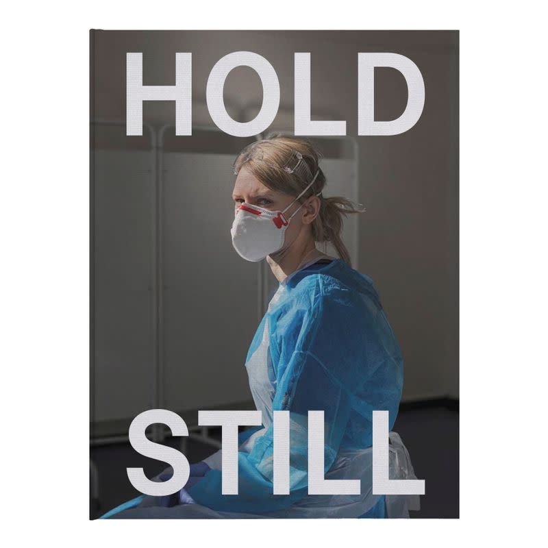 The front cover of the new book "Hold Still: A Portrait of Our Nation in 2020" is seen in this handout picture released by the Kensington Palace
