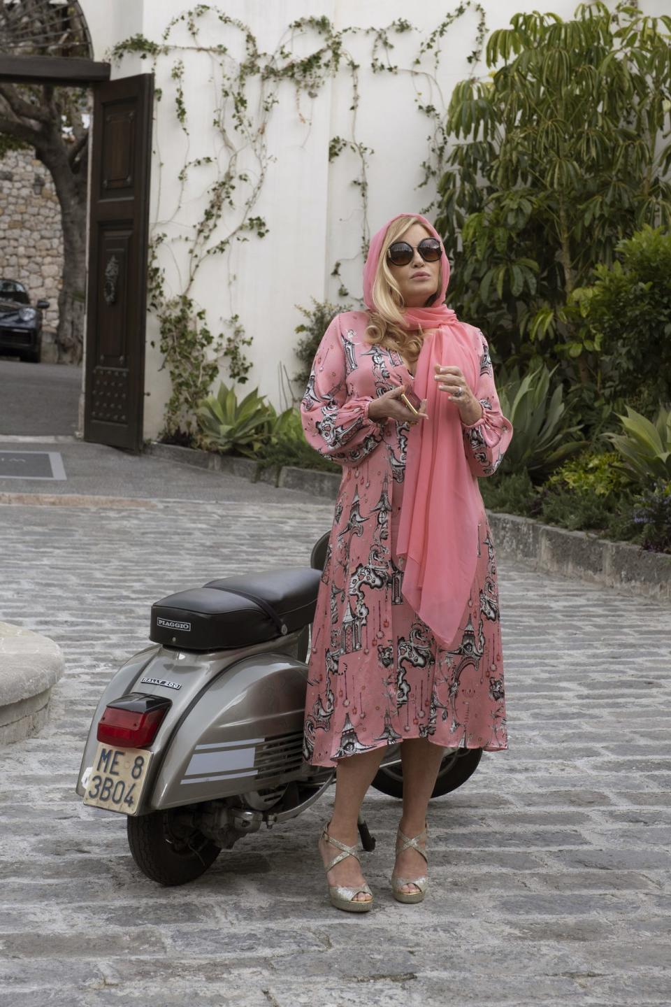 Jennifer Coolidge plays out her Monica Vitti fantasies reprising her role as a wealthy if wacky vacationer in the new season of HBO's "The White Lotus." Coolidge is just one of two actors returning from the original cast.