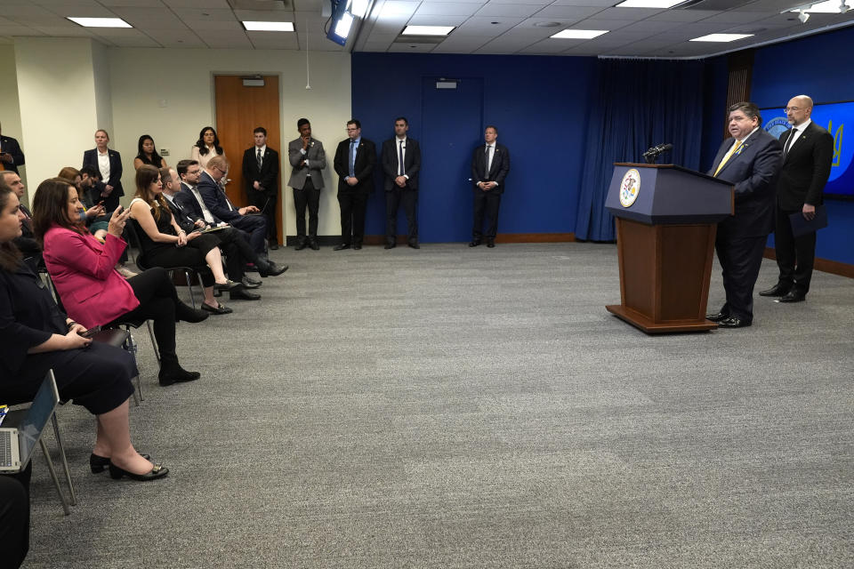 Illinois Gov. J.B. Pritzker, second from right, speaks as Ukrainian Prime Minister Denys Shmyhal, right, listens at a news conference in Chicago, Tuesday, April 16, 2024. They delivered joint remarks recognizing the Illinois-Ukraine partnership. (AP Photo/Nam Y. Huh)