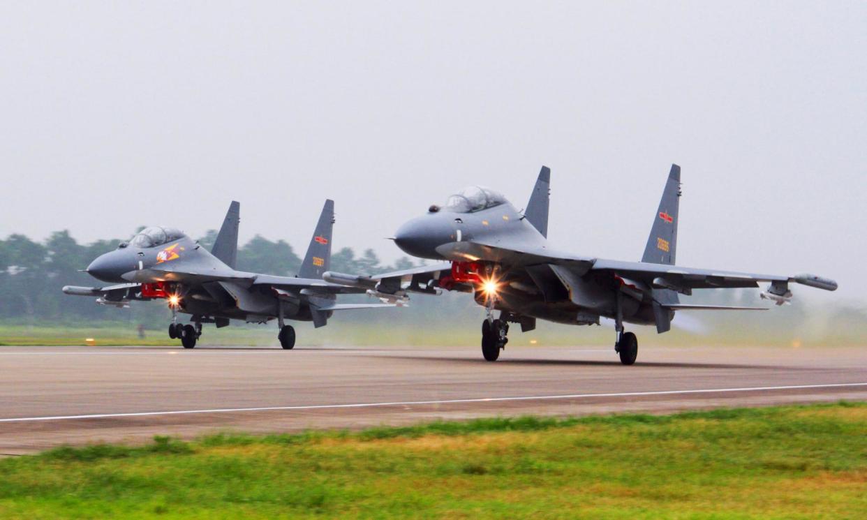 <span>Sukhoi Su-30 fighters similar to the ones pictured are reported to have been among the aircraft in the sortie.</span><span>Photograph: Jin Danhua/AP</span>