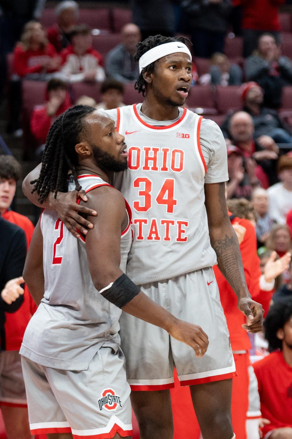 Jan 3, 2024; Columbus, OH, USA;
Ohio State Buckeyes guard Bruce Thornton (2) and Felix Okpara (34) react after a play during their game against the Rutgers Scarlet Knights on Wednesday, Jan. 3, 2024 at Value City Arena.