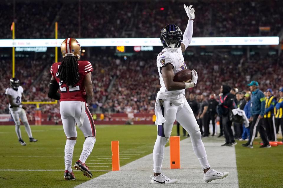Baltimore Ravens wide receiver Nelson Agholor, right, celebrates after scoring next to San Francisco 49ers cornerback Jason Verrett during the second half of an NFL football game in Santa Clara, Calif., Monday, Dec. 25, 2023.