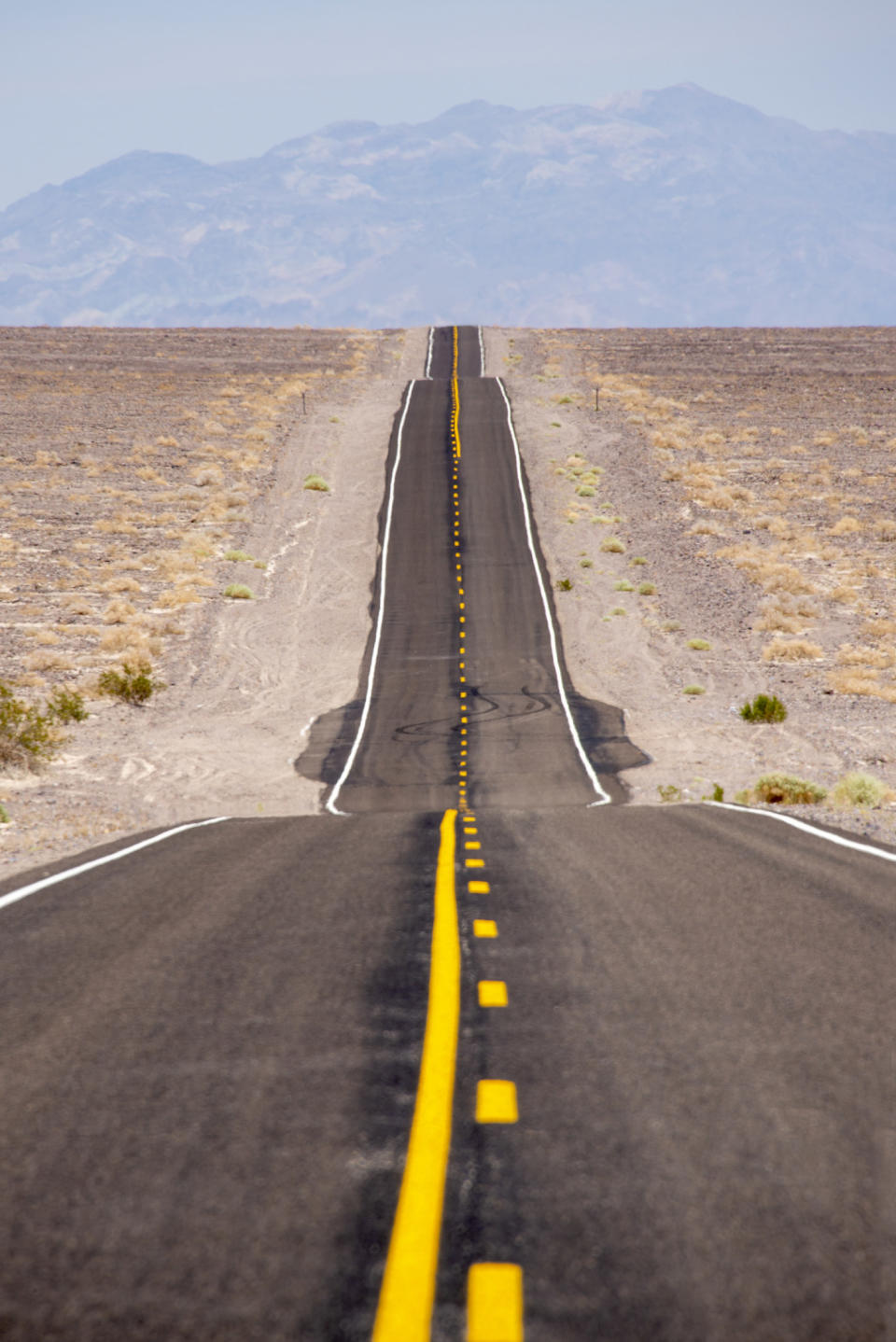 Endless road through the desert of Death Valley