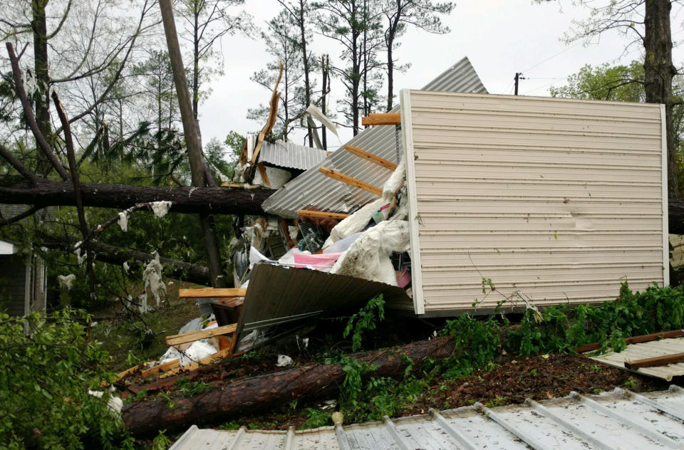 Fallen trees and a shattered sructure are shown in the Screamer community of Henry County, Ala., after a suspected tornado touched down in the county Wednesday, April 5, 2017. National Weather Service meteorologist Mark Wool said a suspected tornado touched down Wednesday in Henry County, Alabama, before crossing into Georgia. (Michele W. Forehand/Dothan Eagle via AP)