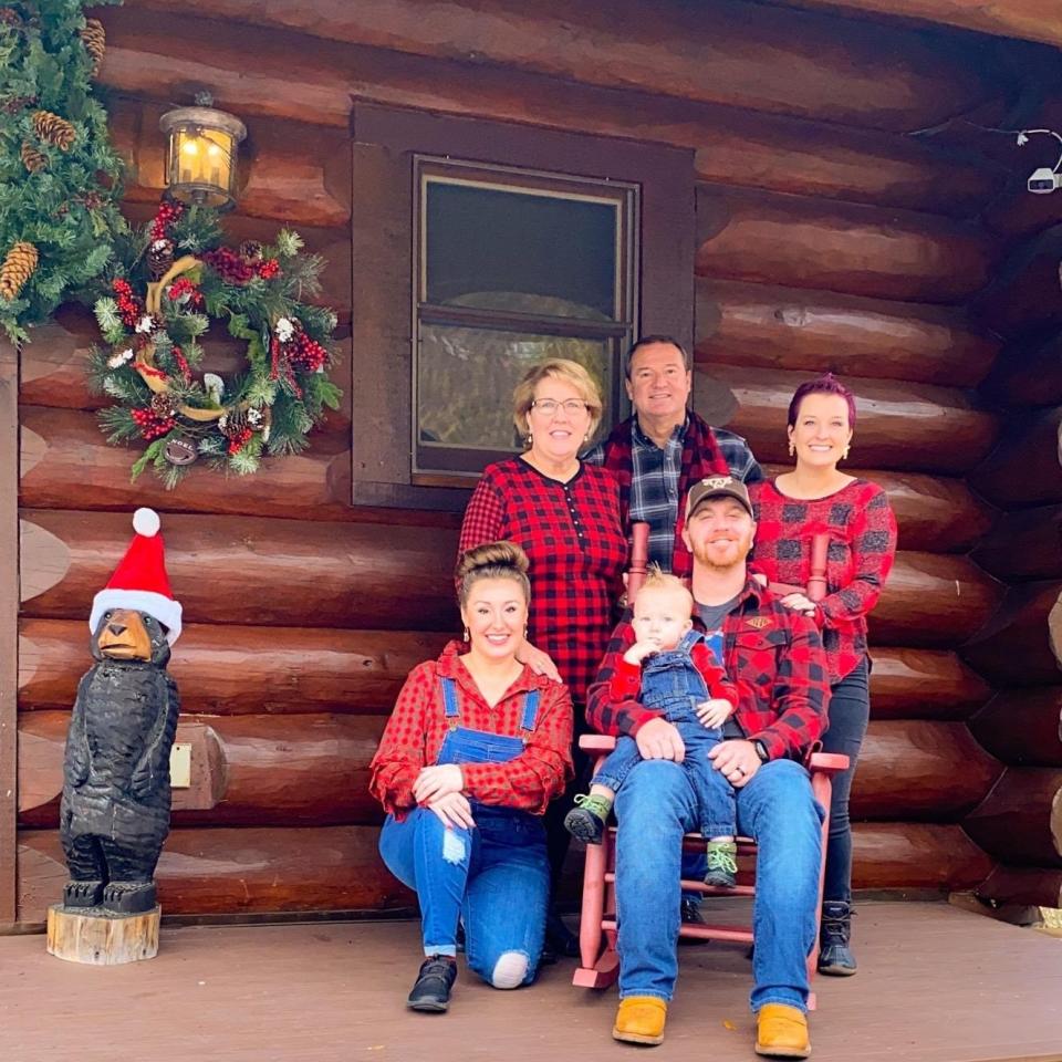 Trish Barrett, back left, is pictured during the Christmas 2021 holidays in Gatlinburg with, clockwise, her husband, Kevin; daughter Olivia Franz; Oliva's husband, Bryan Franz, holding the couple's son, Everett; and Barrett's other daughter, Savannah Barrett.