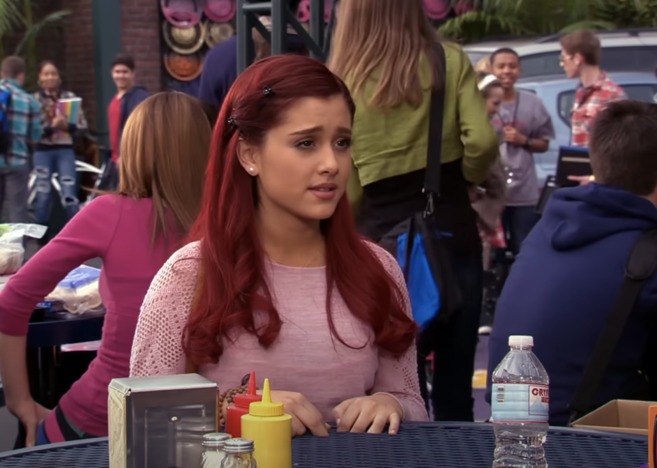 closeup of ariana as cat in a school