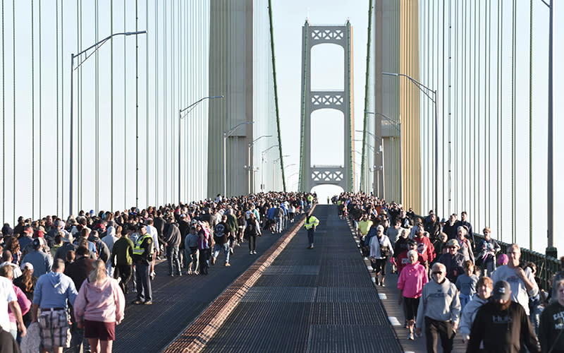 Pedestrians cross the Mackinac Bridge