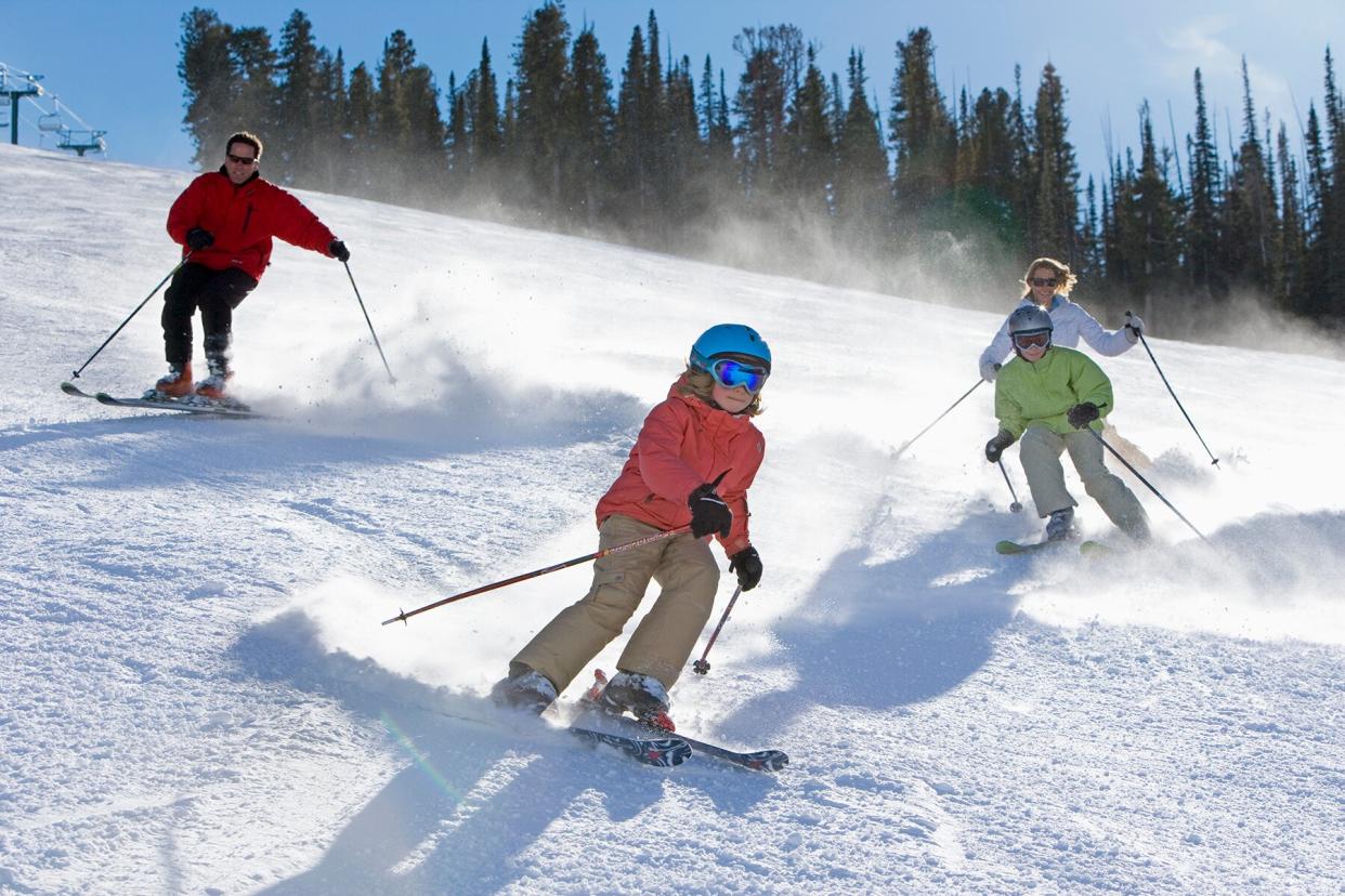 Family Skiing Together