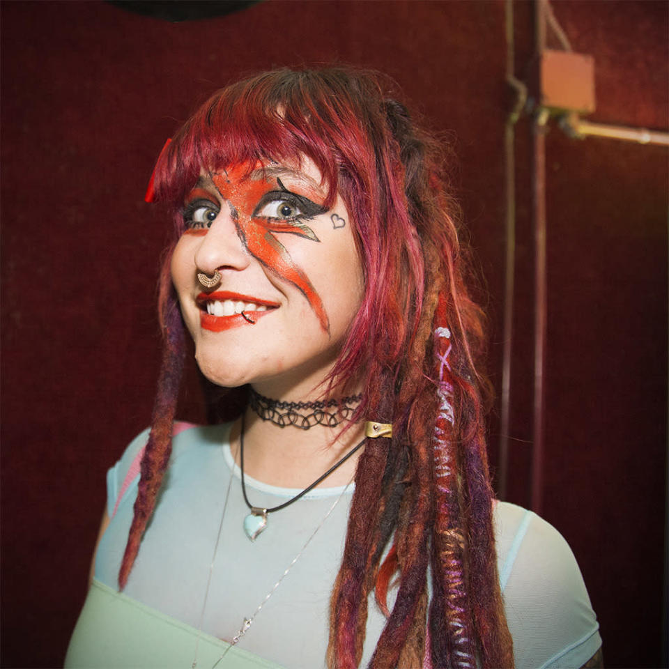 Woman with Ziggy Stardust face paint on at the David Bowie Skate Tribute. 