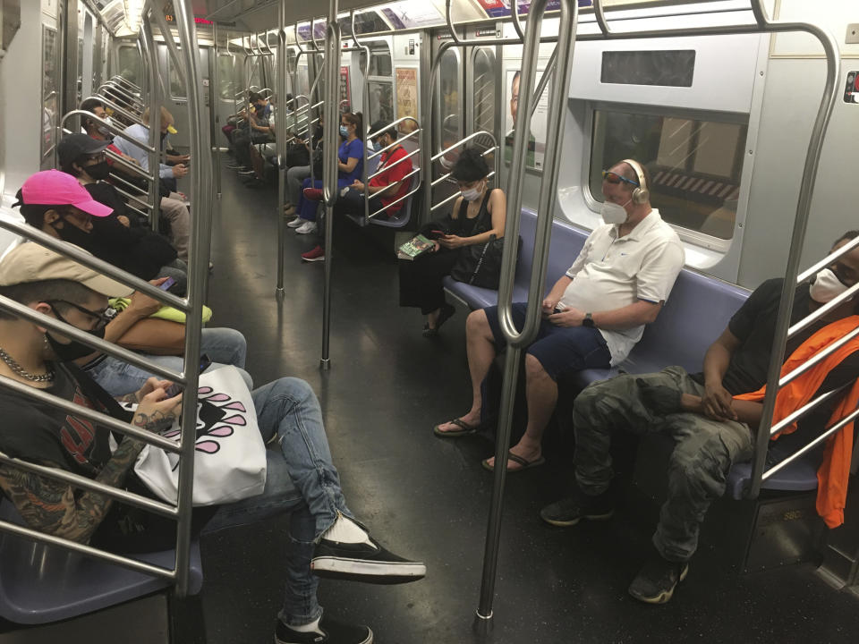 Photo by: STRF/STAR MAX/IPx 2020 6/22/20 Subway riders continue to wear masks during the phase 2 reopening amidst the Coronavirus Pandemic in New York City.