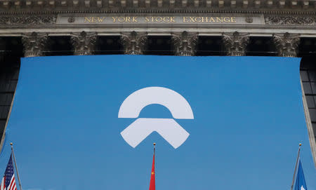 Chinese electric vehicle start-up NIO Inc. logo is on display in front of the New York Stock Exchange (NYSE) to celebrate the company’s initial public offering (IPO) in New York, U.S., September 12, 2018. REUTERS/Brendan McDermid?