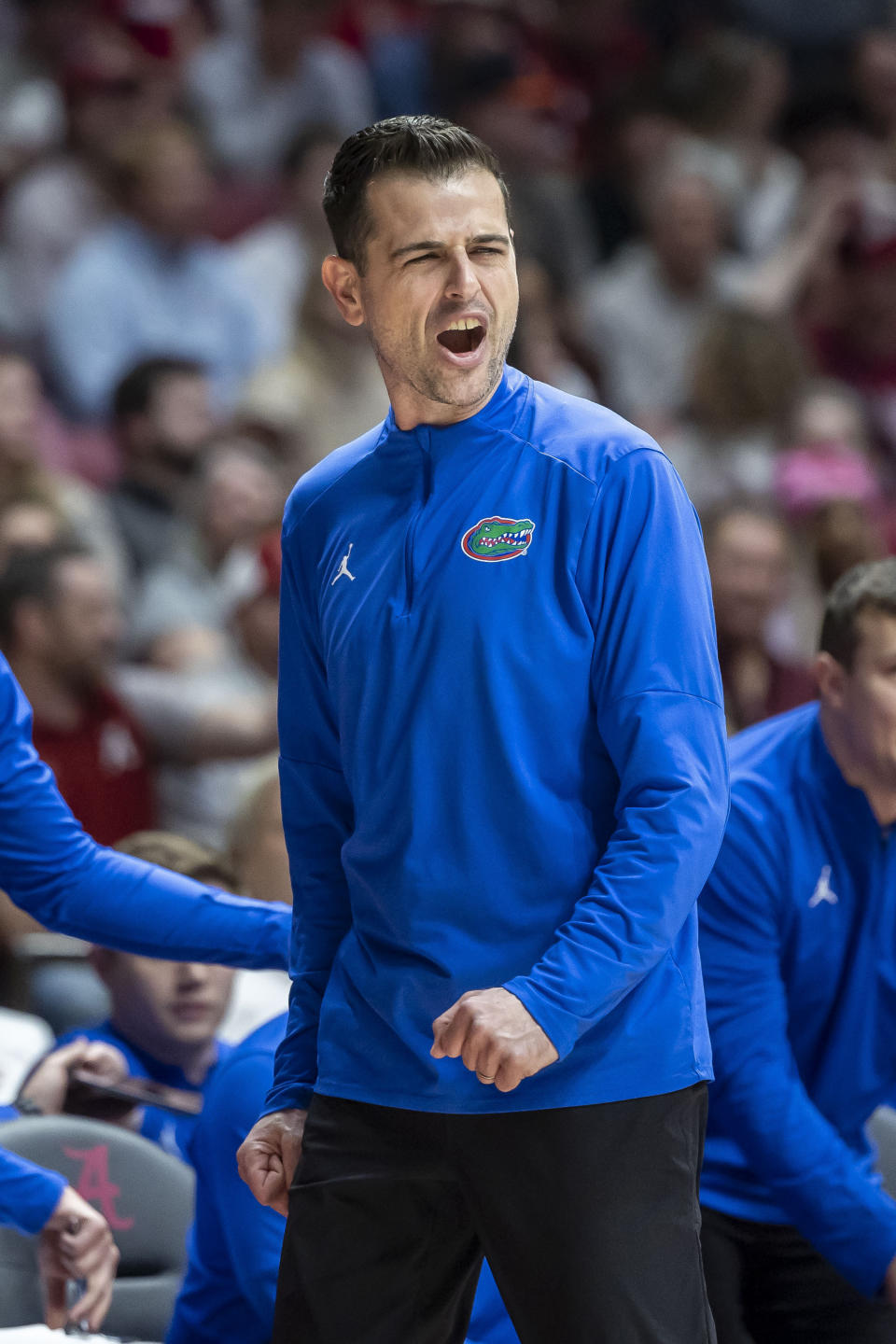 Florida coach Todd Golden talks to players during the first half of the team's NCAA college basketball game against Alabama, Wednesday, Feb. 21, 2024, in Tuscaloosa, Ala. (AP Photo/Vasha Hunt)